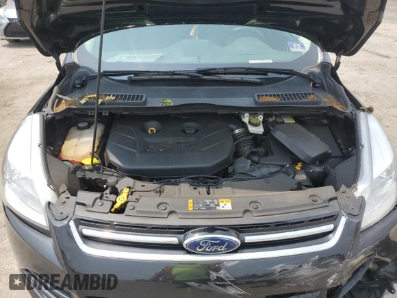 2013 Ford Escape SEL z VIN 1FMCU9H94DUD47723, wystawiony jako Copart lot #59765595 z przebiegiem 129 551 mil mil oraz Szkoda całkowita • Salvage title. Historia ofert i sprzedaży dostępna na DreamBid. Obrazek 12.