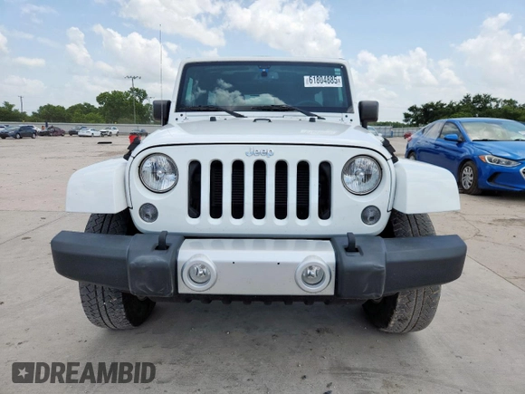 2014 Jeep Wrangler Unlimited Sahara with VIN 1C4BJWEG5EL309502, listed as a Copart auction lot 61804885 with 60,683 mi miles and Salvage title. Bid and sale history available at DreamBid. Image 5.
