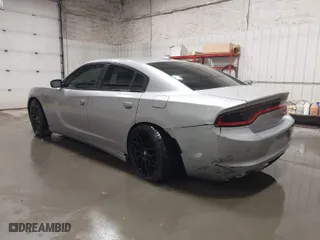 2016 Dodge Charger SXT with VIN 2C3CDXJG9GH180966, listed as a IAAI auction lot 41243491 with 127,235 mi miles. Bid and sale history available at carsss.com. Image 3.