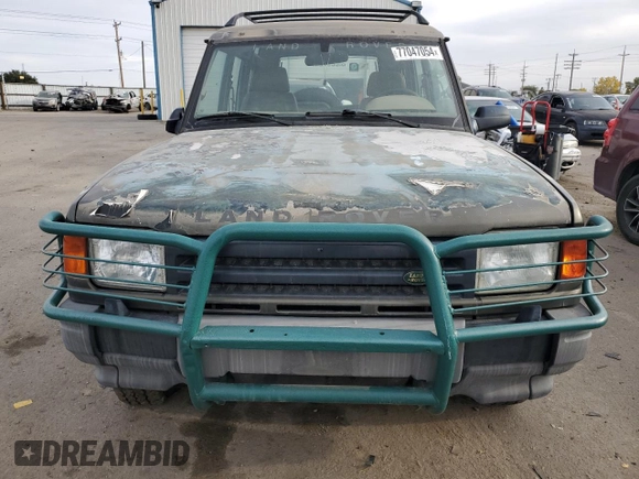 1997 Land Rover Discovery SD z VIN SALJY1249VA705067, wystawiony jako Copart lot #77047054 z przebiegiem 146 965 mil mil oraz Czysty tytuł • Clean title. Historia ofert i sprzedaży dostępna na DreamBid. Obrazek 5.