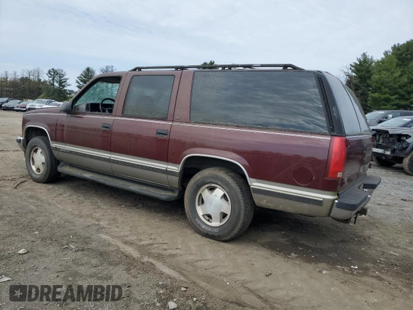 1999 Chevrolet Suburban z VIN 1GNFK16R2XJ328550, wystawiony jako Copart lot #53179525 z przebiegiem 170 914 mil mil oraz Czysty tytuł • Clean title. Historia ofert i sprzedaży dostępna na DreamBid. Obrazek 2.
