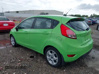 2014 Ford Fiesta SE z VIN 3FADP4EJ8EM233754, wystawiony jako IAAI lot #42108955 z przebiegiem 113 325 mil mil oraz . Historia ofert i sprzedaży dostępna na DreamBid. Obrazek 3.