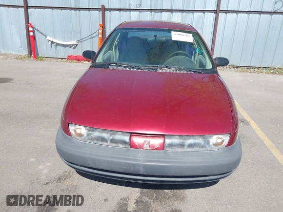 1996 Saturn SL with VIN 1G8ZG5289TZ214790, listed as a IAAI auction lot 42090262 with 197,485 mi miles. Bid and sale history available at carsss.com. Image 6.
