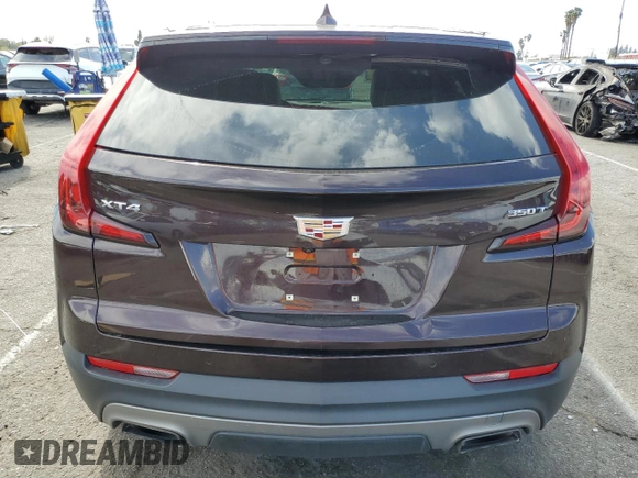 2020 Cadillac XT4 FWD Premium Luxury with VIN 1GYFZCR46LF112188, listed as a Copart auction lot 51536115 with 31,427 mi miles and Salvage title. Bid and sale history available at DreamBid. Image 6.