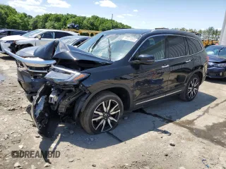 2022 Honda Pilot Touring 7-Passenger with VIN 5FNYF6H62NB057161, listed as a Copart auction lot 56423864 with 0 mi miles and Salvage Title. Bid and sale history available at carsss.com. Image 1.