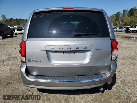 2018 Dodge Grand Caravan SE Plus with VIN 2C4RDGBG0JR136750, listed as a Copart auction lot 50957305 with 106,996 mi miles and Salvage Title. Bid and sale history available at DreamBid. Image 6.