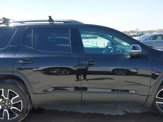 2021 GMC Acadia SLT with VIN 1GKKNMLS7MZ204928, listed as a IAAI auction lot 41719245 with 76,825 mi miles. Bid and sale history available at carsss.com. Image 14.