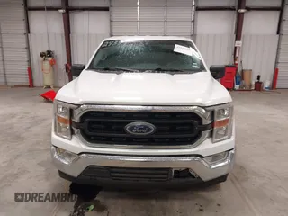 2021 Ford F-150 XL with VIN 1FTEW1C57MFA71572, listed as a IAAI auction lot 41549588 with 82,389 mi miles and . Bid and sale history available at carsss.com. Image 13.