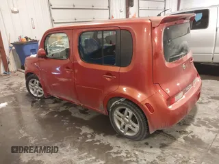 2009 Nissan Cube SL z VIN JN8AZ28R29T119001, wystawiony jako IAAI lot #41583215 z przebiegiem 203 906 mil mil oraz . Historia ofert i sprzedaży dostępna na DreamBid. Obrazek 3.