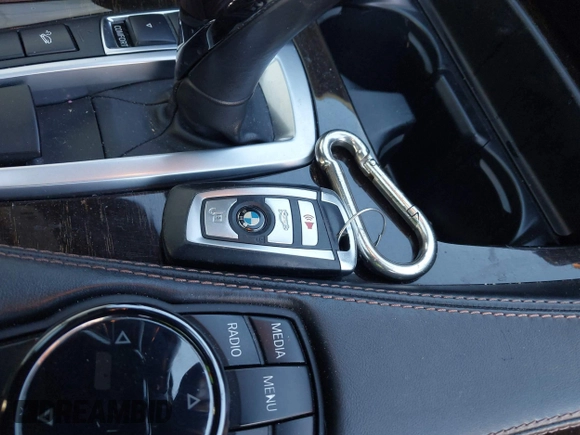 2015 BMW 6 Series 640i xDrive with VIN WBA6B8C50FD453317, listed as a IAAI auction lot 41635430 with 77,811 mi miles and . Bid and sale history available at DreamBid. Image 11.