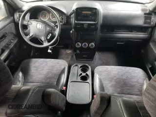 2002 Honda CR-V LX with VIN JHLRD68512C009941, listed as a Copart auction lot 87699075 with 133,311 mi miles and Salvage Title. Bid and sale history available at DreamBid. Image 8.
