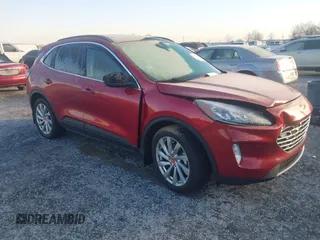 2021 Ford Escape Titanium Hybrid z VIN 1FMCU9DZ3MUA00051, wystawiony jako IAAI lot #41259126 z przebiegiem 100 745 mil mil oraz . Historia ofert i sprzedaży dostępna na DreamBid. Obrazek 1.