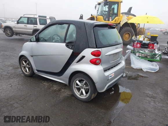 2015 Smart fortwo Passion with VIN WMEEJ3BA9FK819985, listed as a IAAI auction lot 41879486 with 79,394 mi miles. Bid and sale history available at carsss.com. Image 3.