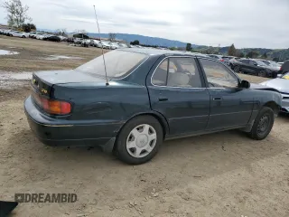 1994 Toyota Camry LE z VIN JT2GK12E2R0039606, wystawiony jako Copart lot #49840015 z przebiegiem 197 834 mil mil oraz Szkoda całkowita • Salvage title. Historia ofert i sprzedaży dostępna na DreamBid. Obrazek 3.