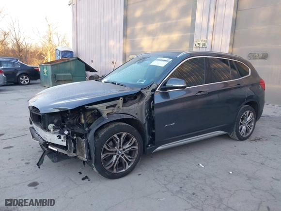 2017 BMW X1 xDrive28i with VIN WBXHT3C33H5F87591, listed as a IAAI auction lot 41256899 with 69,362 mi miles. Bid and sale history available at carsss.com. Image 18.