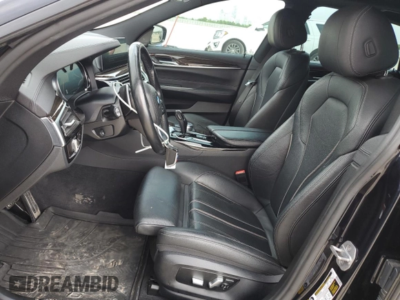 2018 BMW 6 Series 640i xDrive z VIN WBAJV6C52JBJ99507, wystawiony jako Copart lot #52184495 z przebiegiem 142 145 mil mil oraz Szkoda całkowita • Salvage title. Historia ofert i sprzedaży dostępna na DreamBid. Obrazek 7.