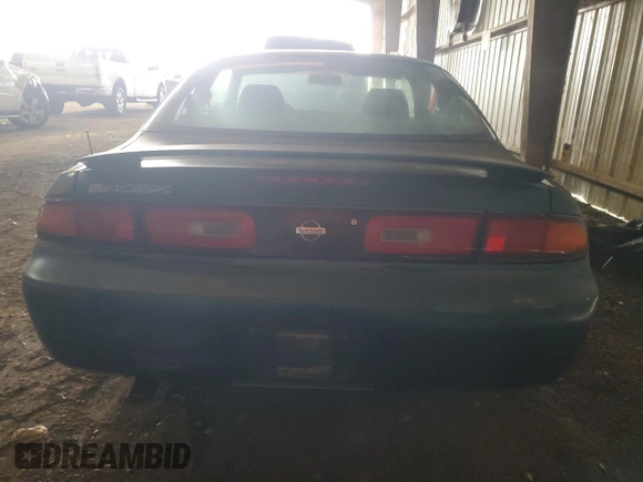 1995 Nissan 240SX z VIN JN1AS44D6SW020744, wystawiony jako Copart lot #64406924 z przebiegiem 87 165 mil mil oraz Szkody całkowita. Historia ofert i sprzedaży dostępna na DreamBid. Obrazek 6.