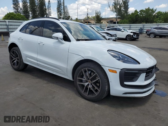 2022 Porsche Macan with VIN WP1AA2A51NLB03679, listed as a Copart auction lot 57832945 with 26,566 mi miles and Salvage title. Bid and sale history available at DreamBid. Image 4.