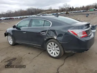 2015 Buick LaCrosse Leather with VIN 1G4GC5G33FF252667, listed as a Copart auction lot 52872815 with 76,709 mi miles and Salvage Title. Bid and sale history available at carsss.com. Image 2.