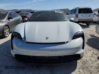 2021 Porsche Taycan z VIN WP0AA2Y13MSA17480, wystawiony jako Copart lot #41578233 z przebiegiem Nie podano mil oraz . Historia ofert i sprzedaży dostępna na DreamBid. Obrazek 5.