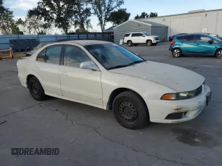 2003 Mitsubishi Galant ES z VIN 4A3AA46G43E124340, wystawiony jako Copart lot #74021014 z przebiegiem 220 226 mil mil oraz Szkoda całkowita • Salvage title. Historia ofert i sprzedaży dostępna na DreamBid. Obrazek 4.