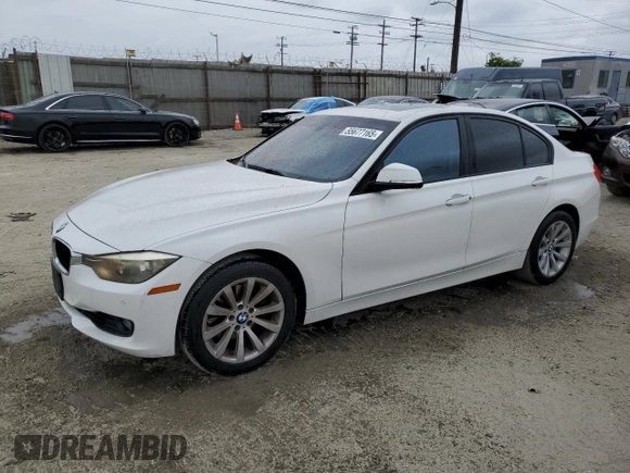 2013 BMW 3 Series 328i with VIN WBA3A5G57DNP23598, listed as a Copart auction lot 55677165 with 217,977 mi miles and Clean Title. Bid and sale history available at DreamBid. Image 1.