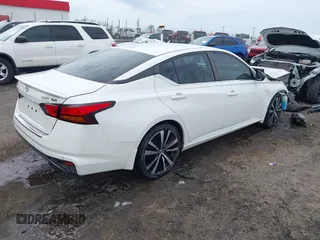 2021 Nissan Altima SR with VIN 1N4BL4CV0MN376551, listed as a IAAI auction lot 41884880 with 74,024 mi miles and . Bid and sale history available at carsss.com. Image 4.