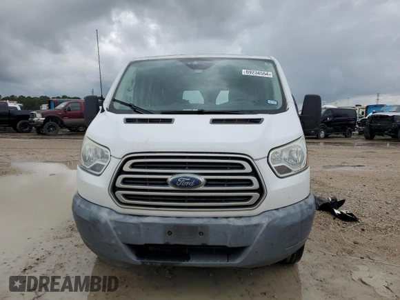 2016 Ford Transit Cargo with VIN 1FTYR1ZM8GKA89853, listed as a Copart auction lot 69234554 with 200,049 mi miles and Salvage Title. Bid and sale history available at DreamBid. Image 5.