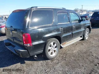 2006 Cadillac Escalade with VIN 1GYEK63NX6R110465, listed as a IAAI auction lot 41268338 with 202,042 mi miles. Bid and sale history available at carsss.com. Image 4.