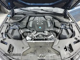 2023 BMW 5 Series M550i xDrive z VIN WBA13BK02PCN82953, wystawiony jako Copart lot #68124264 z przebiegiem 10 010 mil mil oraz Szkoda całkowita • Salvage title. Historia ofert i sprzedaży dostępna na DreamBid. Obrazek 11.