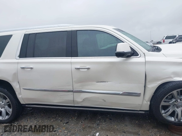 2015 Cadillac Escalade ESV Premium z VIN 1GYS4TKJ6FR708255, wystawiony jako IAAI lot #42244621 z przebiegiem 31 407 mil mil oraz . Historia ofert i sprzedaży dostępna na DreamBid. Obrazek 14.