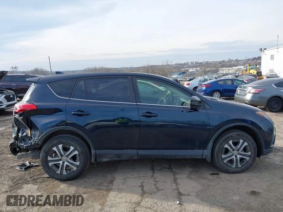 2018 Toyota RAV4 LE with VIN JTMBFREV5JD253342, listed as a IAAI auction lot 41656581 with 243,791 mi miles and . Bid and sale history available at DreamBid. Image 14.