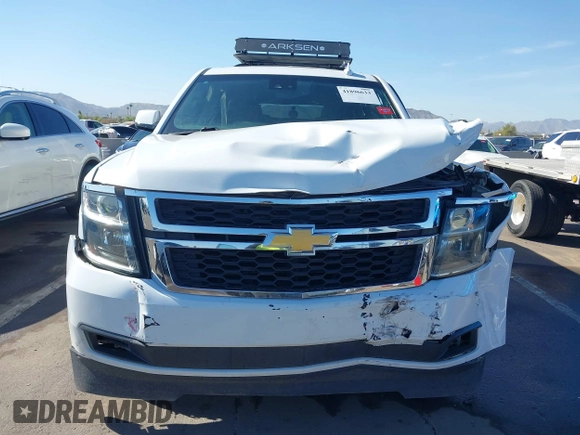2019 Chevrolet Suburban LT with VIN 1GNSCHKC3KR143942, listed as a IAAI auction lot 41896633 with 153,139 mi miles and . Bid and sale history available at DreamBid. Image 6.