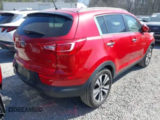 2011 Kia Sportage EX with VIN KNDPC3A22B7013561, listed as a IAAI auction lot 41785301 with 136,498 mi miles and . Bid and sale history available at carsss.com. Image 4.