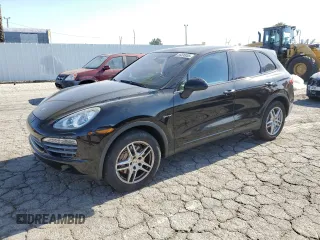 2012 Porsche Cayenne S Hybrid z VIN WP1AE2A21CLA92318, wystawiony jako Copart lot #55595055 z przebiegiem 82 184 mil mil oraz Szkody całkowita. Historia ofert i sprzedaży dostępna na DreamBid. Obrazek 1.