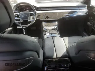 2022 Audi A8 with VIN WAULDAF89NN006262, listed as a Copart auction lot 57478025 with 13,020 mi miles and Salvage title. Bid and sale history available at DreamBid. Image 8.