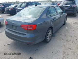 2015 Volkswagen Jetta SE z VIN 3VWD17AJ1FM241454, wystawiony jako IAAI lot #41819906 z przebiegiem 151 947 mil mil oraz . Historia ofert i sprzedaży dostępna na DreamBid. Obrazek 4.