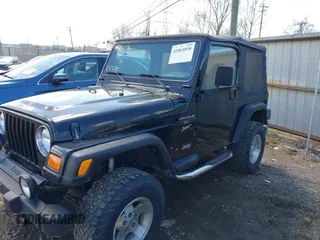 2000 Jeep Wrangler Sport with VIN 1J4FA49S8YP749547, listed as a IAAI auction lot 41861030 with 110,186 mi miles and . Bid and sale history available at DreamBid. Image 14.