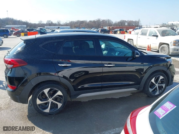 2017 Hyundai Tucson Value with VIN KM8J33A25HU586191, listed as a IAAI auction lot 41682127 with 58,877 mi miles. Bid and sale history available at carsss.com. Image 13.
