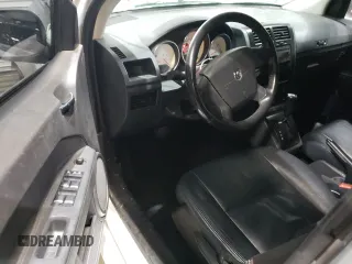 2009 Dodge Caliber R/T z VIN 1B3HB78B79D168527, wystawiony jako Copart lot #43616005 z przebiegiem 168 694 mil mil oraz Szkoda całkowita • Salvage title. Historia ofert i sprzedaży dostępna na DreamBid. Obrazek 8.