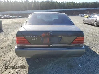 1993 Mercedes-Benz 400 z VIN WDBGA43E5PA107736, wystawiony jako Copart lot #87721115 z przebiegiem 192 418 mil mil oraz Tytuł czysty. Historia ofert i sprzedaży dostępna na DreamBid. Obrazek 6.