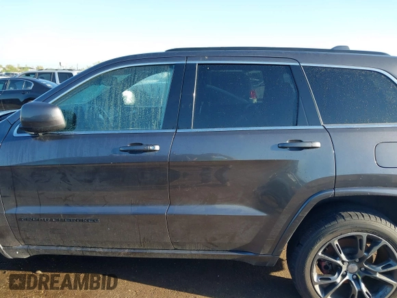 2015 Jeep Grand Cherokee Laredo with VIN 1C4RJFAGXFC631123, listed as a IAAI auction lot 41859251 with 201,558 mi miles. Bid and sale history available at carsss.com. Image 14.