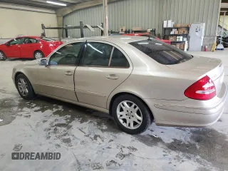 2003 Mercedes-Benz E-Class 3.2L with VIN WDBUF65J03A097069, listed as a Copart auction lot 66235744 with 168,623 mi miles and Clean Title. Bid and sale history available at carsss.com. Image 2.