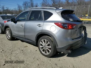 2015 Mazda CX-5 Grand Touring with VIN JM3KE4DY5F0460465, listed as a Copart auction lot 46392605 with 103,185 mi miles and Salvage Title. Bid and sale history available at carsss.com. Image 2.