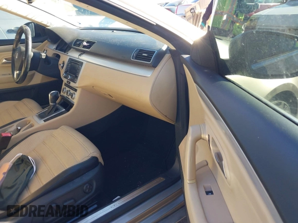 2014 Volkswagen CC Sport with VIN WVWBN7AN1EE518559, listed as a IAAI auction lot 41208853 with 154,957 mi miles. Bid and sale history available at carsss.com. Image 5.