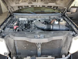 2005 Ford F-150 STX z VIN 1FTRX14WX5FB39323, wystawiony jako Copart lot #59340055 z przebiegiem 250 833 mil mil oraz Czysty tytuł • Clean title. Historia ofert i sprzedaży dostępna na DreamBid. Obrazek 11.