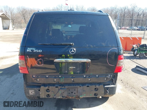 2005 Mercedes-Benz M-Class 3.7L with VIN 4JGAB57E05A537929, listed as a IAAI auction lot 41735013 with 175,695 mi miles. Bid and sale history available at carsss.com. Image 16.