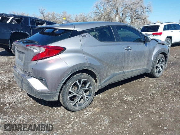 2018 Toyota C-HR XLE with VIN NMTKHMBX4JR035415, listed as a IAAI auction lot 41823751 with 75,566 mi miles. Bid and sale history available at carsss.com. Image 4.