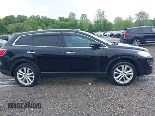 2012 Mazda CX-9 Grand Touring z VIN JM3TB3DV1C0360212, wystawiony jako IAAI lot #42232584 z przebiegiem 99 582 mil mil oraz . Historia ofert i sprzedaży dostępna na DreamBid. Obrazek 13.