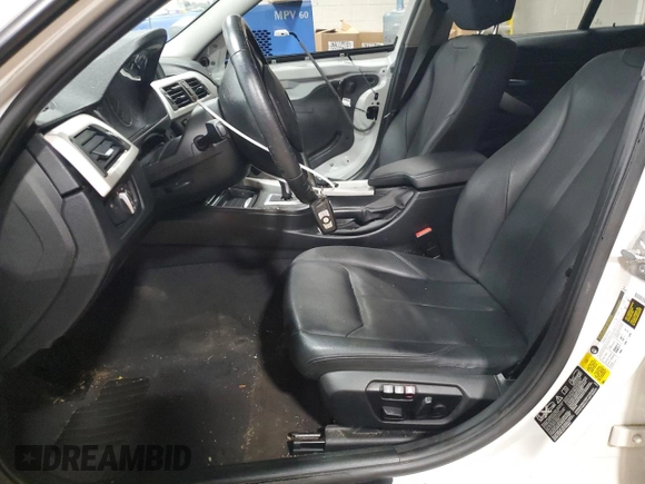 2013 BMW 3 Series 320i xDrive with VIN WBA3C3C5XDF982732, listed as a Copart auction lot 62852385 with 134,466 mi miles and Salvage title. Bid and sale history available at DreamBid. Image 7.